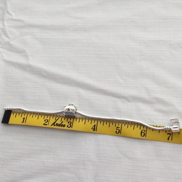 Woman’s Bracelet with one charm that reads I love to travel color sliver.NWOT - Picture 3 of 4